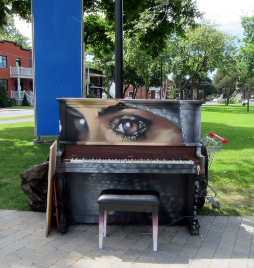 Public piano (and grocery cart) at Parc Beaudet in St. Laurent, just outside the du College station